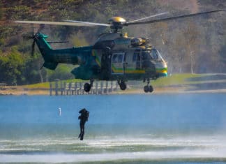 7 David Barile Public Safety Diver jumping out of a helicopter